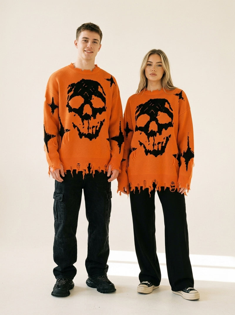 Man and woman wearing the same GRAVEKNIT skull knit sweater, unisex fit