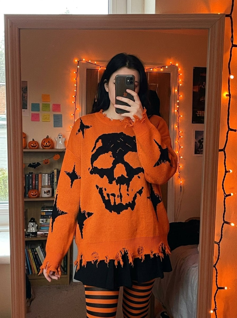 Mirror selfie in the orange skull knit sweater